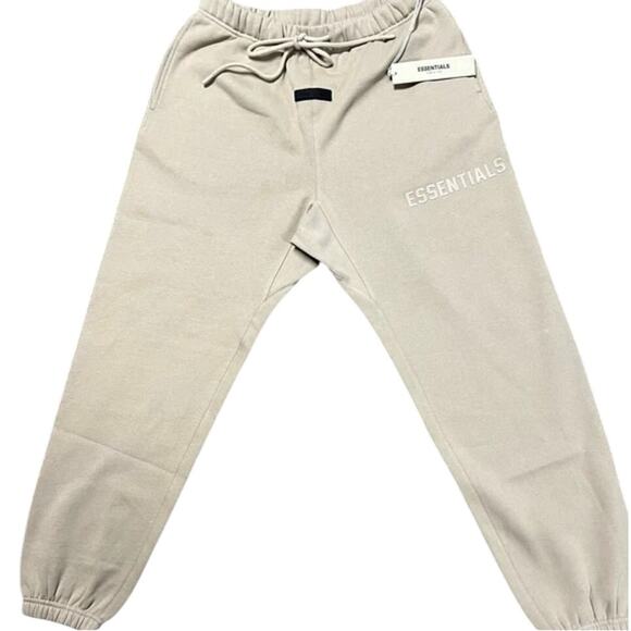 (S) $140 NWT Fear of God Essentials Sweatpants Dusty Beige - Picture 1 of 5